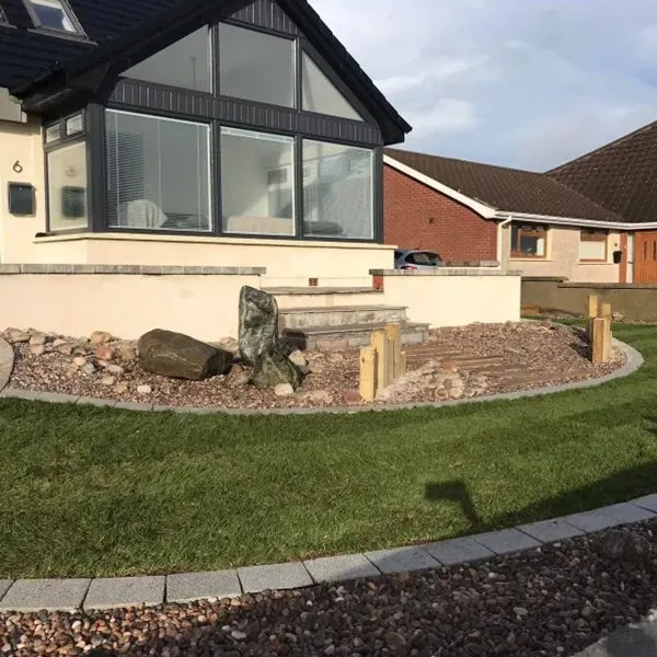 Stones with steps up to house